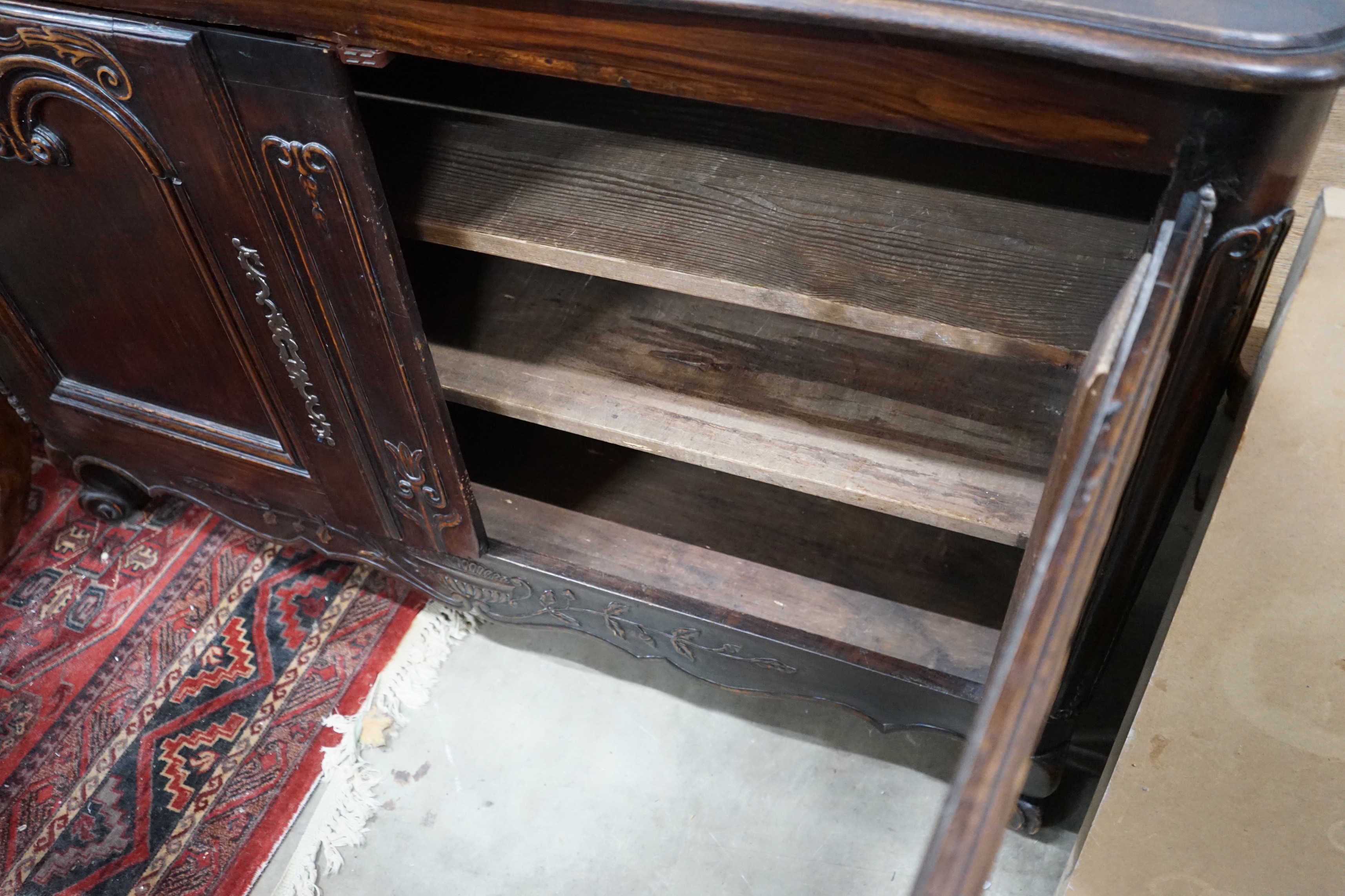 An 18th century style French two door side cabinet, width 148cm, depth 69cm, height 100cm